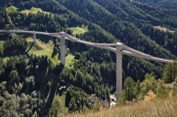 Ganter Bridge in Ried-Brig (1977–1980). This 150m-high, 678m-long structure was designed with low towers above the deck, and stiff cable stays cast into sold concrete walls [© Ralph Feiner]